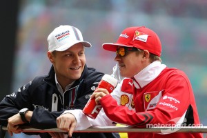 Valtteri Bottas (FIN), Williams F1 Team and Kimi Raikkonen (FIN), Scuderia Ferrari  20.04.2014. Formula 1 World Championship, Rd 4, Chinese Grand Prix, Shanghai, China, Race Day. - www.xpbimages.com, EMail: requests@xpbimages.com - copy of publication required for printed pictures. Every used picture is fee-liable. © Copyright: Charniaux / XPB Images